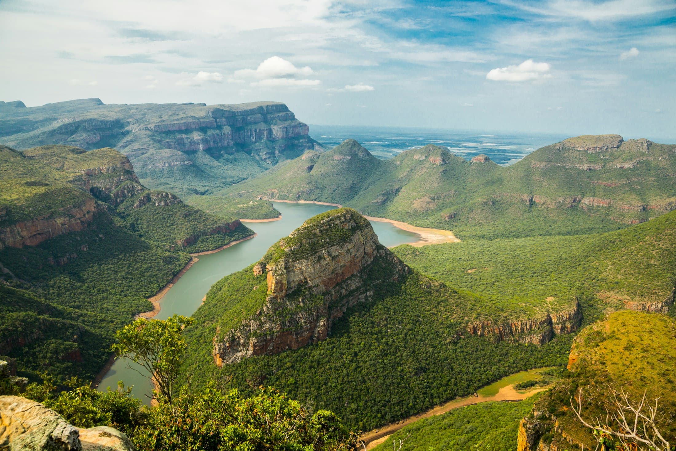 Green mountain valleys and a winding river in the South African highlands